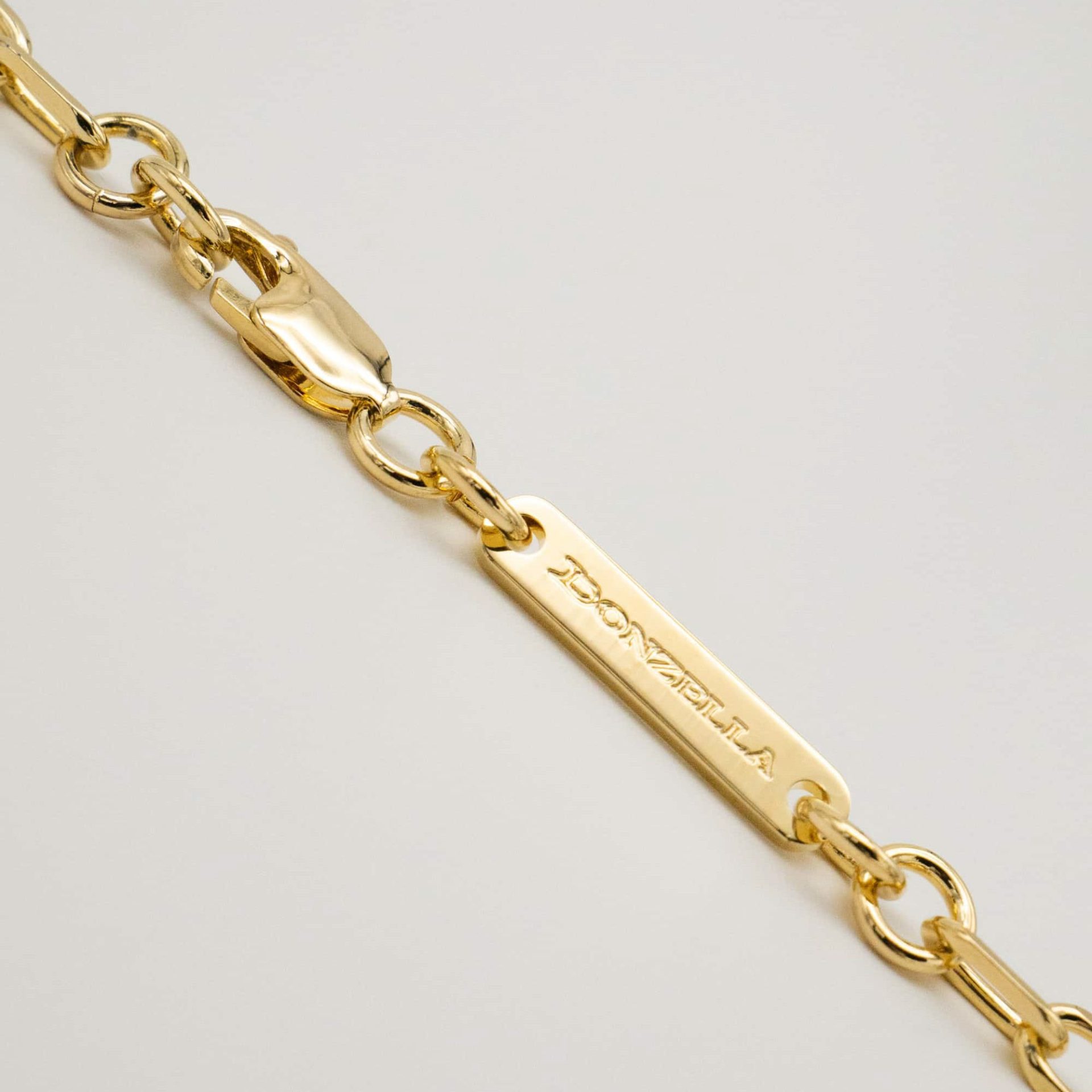 VERA NECKLACE | GOLD · tag detail
